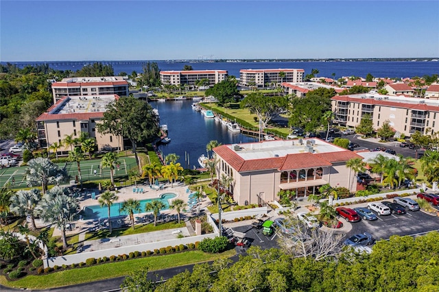 birds eye view of property with a water view