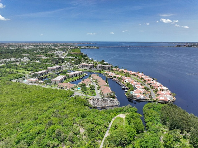 birds eye view of property featuring a water view