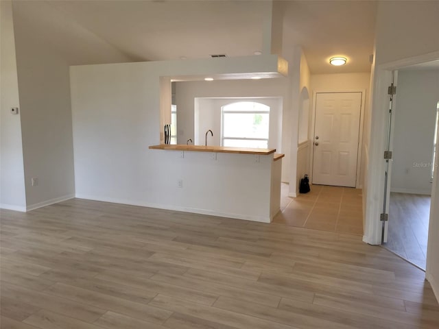 interior space with light tile floors