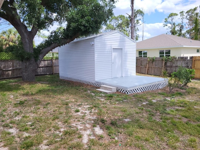 view of outdoor structure with a lawn