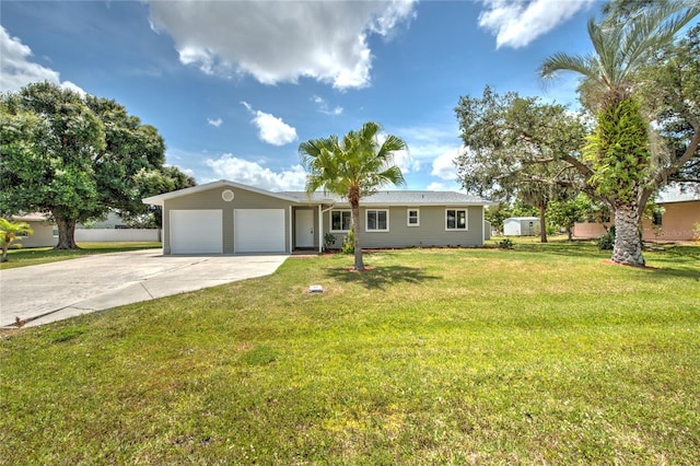 single story home featuring a front yard and a garage