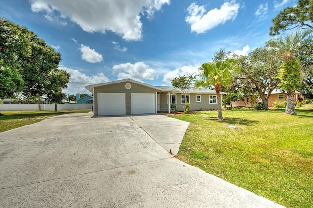 single story home featuring a front lawn