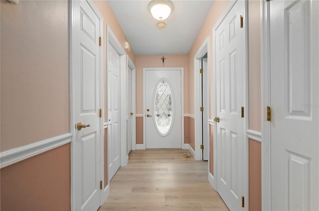 doorway to outside featuring light hardwood / wood-style flooring