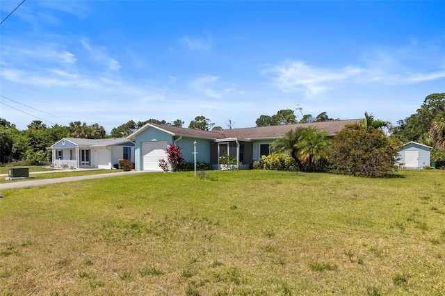 ranch-style house with a front yard and a garage