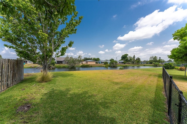 view of yard with a water view