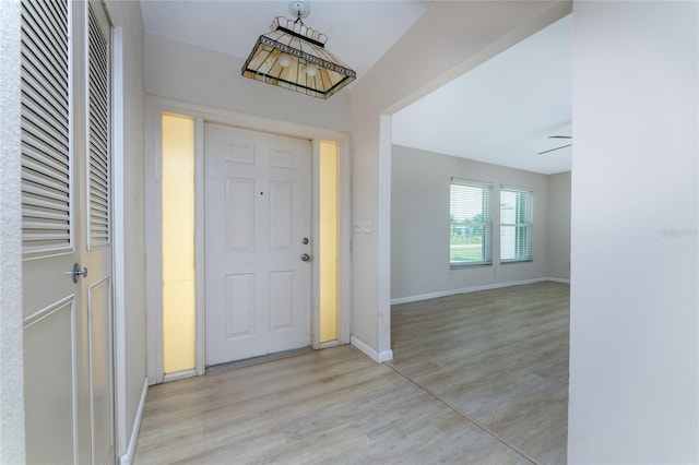 entrance foyer featuring ceiling fan and light hardwood / wood-style flooring