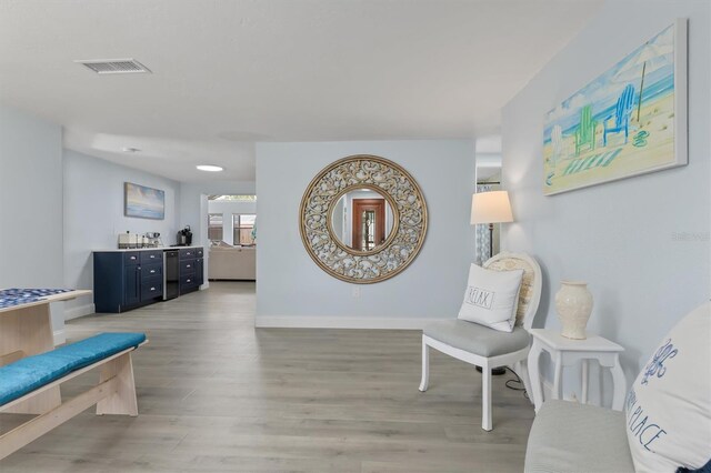 living area featuring light hardwood / wood-style floors