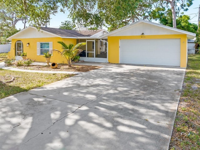 ranch-style home with a garage