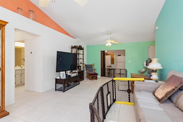 bedroom featuring white refrigerator, tile floors, ceiling fan, and lofted ceiling