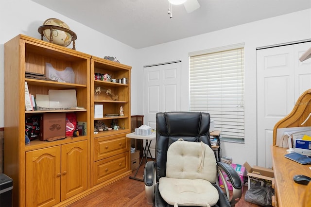 office space featuring hardwood / wood-style floors and ceiling fan