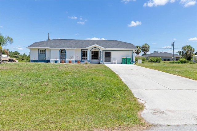 ranch-style home with a garage and a front lawn