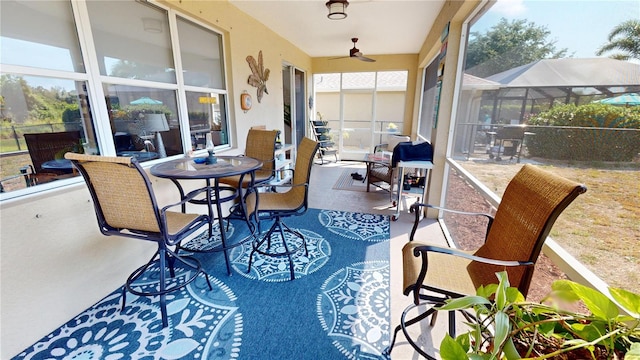 sunroom / solarium with ceiling fan