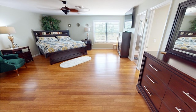 bedroom featuring light hardwood / wood-style flooring and ceiling fan