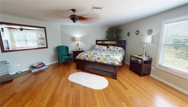 bedroom featuring ceiling fan and light hardwood / wood-style floors