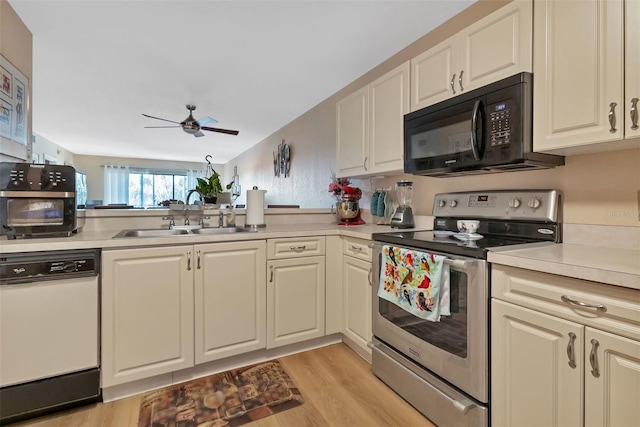 kitchen with ceiling fan, sink, dishwasher, light wood-type flooring, and stainless steel range with electric stovetop