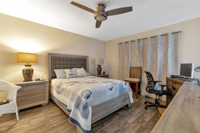 bedroom featuring ceiling fan and light wood-type flooring