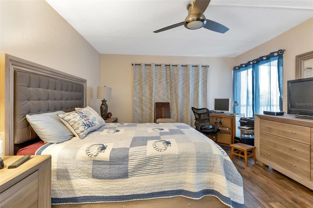 bedroom featuring wood-type flooring and ceiling fan