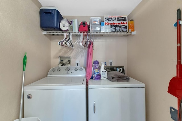 laundry room with washer hookup and separate washer and dryer