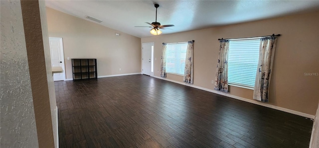 unfurnished living room with ceiling fan, lofted ceiling, and wood-type flooring