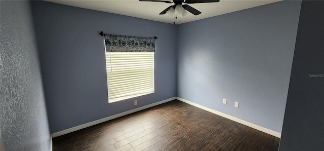 empty room featuring ceiling fan and hardwood / wood-style floors