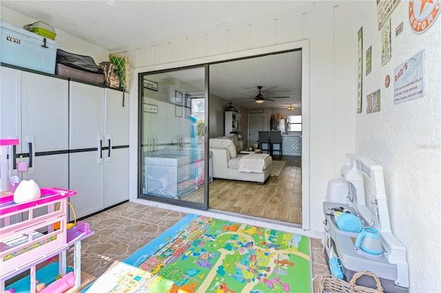 playroom featuring ceiling fan