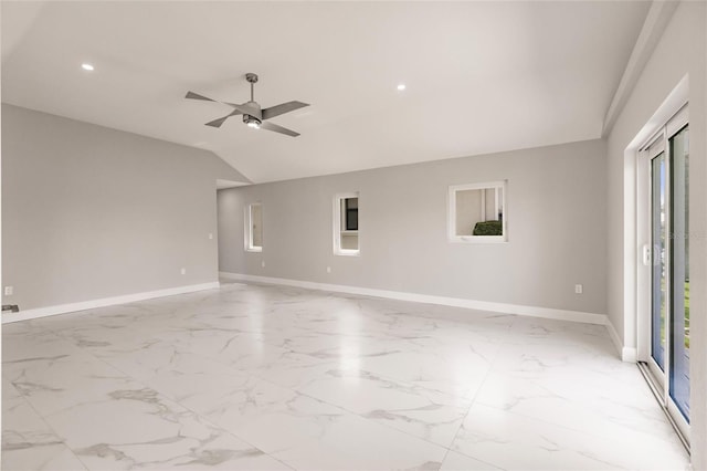 unfurnished room featuring ceiling fan and lofted ceiling