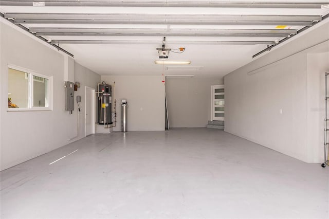 garage with electric panel, water heater, and a garage door opener