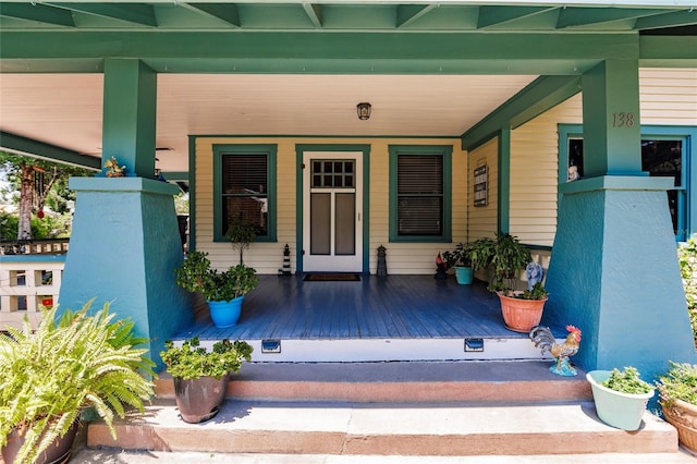 doorway to property with covered porch