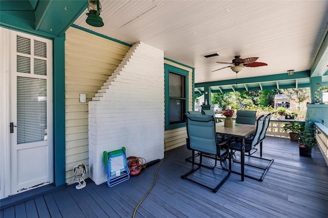 wooden deck with ceiling fan