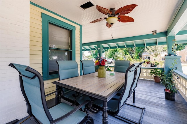 wooden deck with ceiling fan