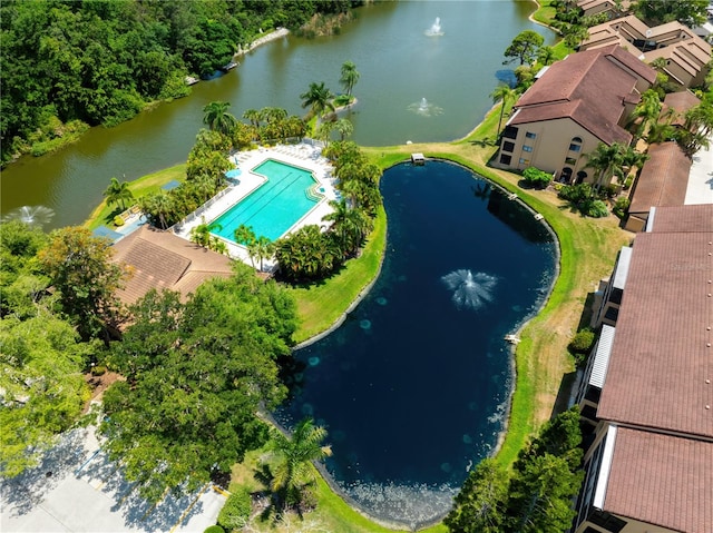 birds eye view of property featuring a water view