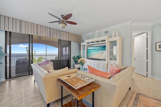 tiled living room with ornamental molding and ceiling fan