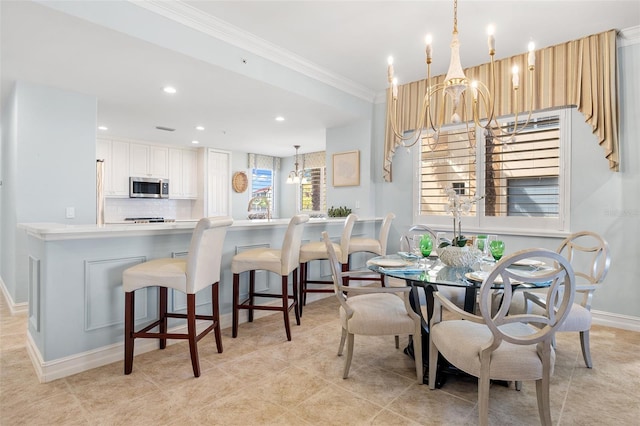 dining space featuring ornamental molding and light tile floors