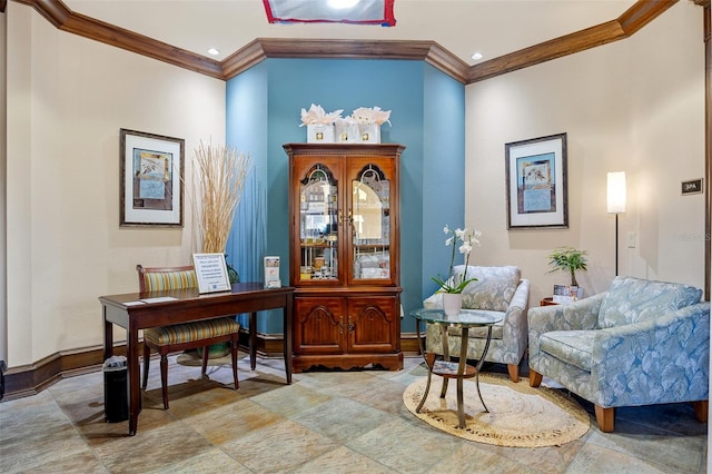 office area with ornamental molding and tile floors