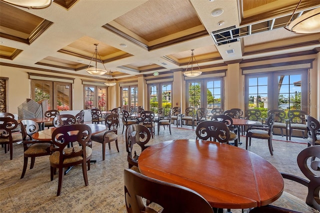 dining space with coffered ceiling, french doors, and crown molding