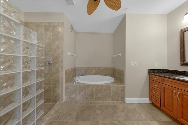 bathroom with ceiling fan, vanity, shower with separate bathtub, and tile floors