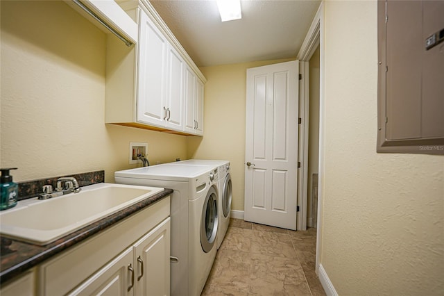 laundry room featuring light tile floors, cabinets, sink, washer hookup, and separate washer and dryer