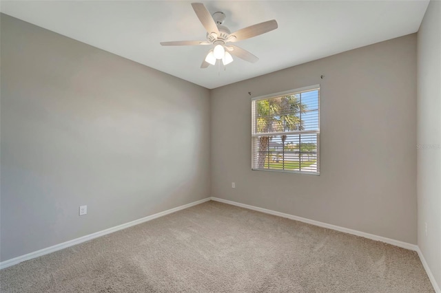 unfurnished room featuring carpet floors and ceiling fan