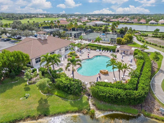 drone / aerial view with a water view