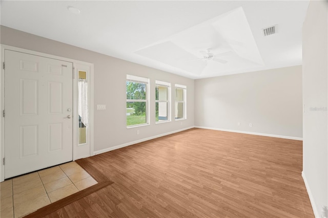 foyer entrance featuring ceiling fan and light hardwood / wood-style floors