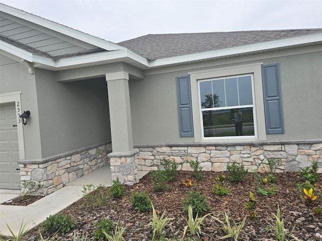 entrance to property featuring a garage