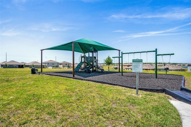 view of play area featuring a lawn