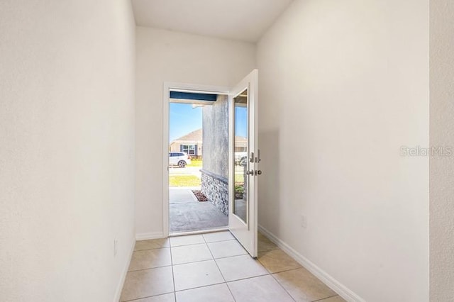 entryway with light tile floors