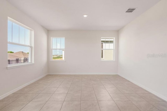 view of tiled spare room