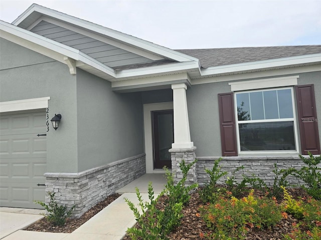 property entrance with a garage