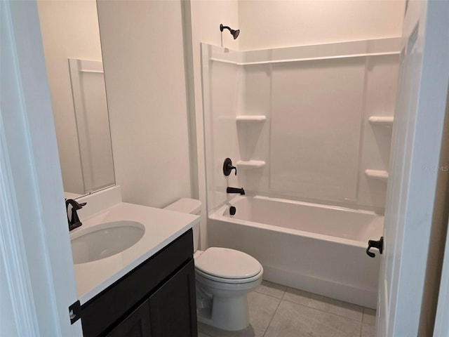 full bathroom with tile floors, shower / bathing tub combination, toilet, and vanity with extensive cabinet space