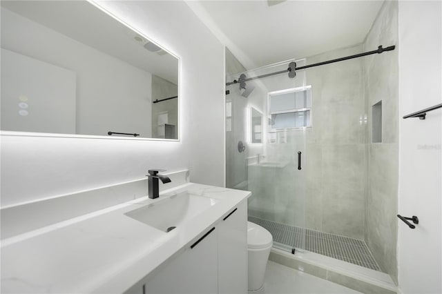 bathroom featuring an enclosed shower, toilet, tile floors, and large vanity