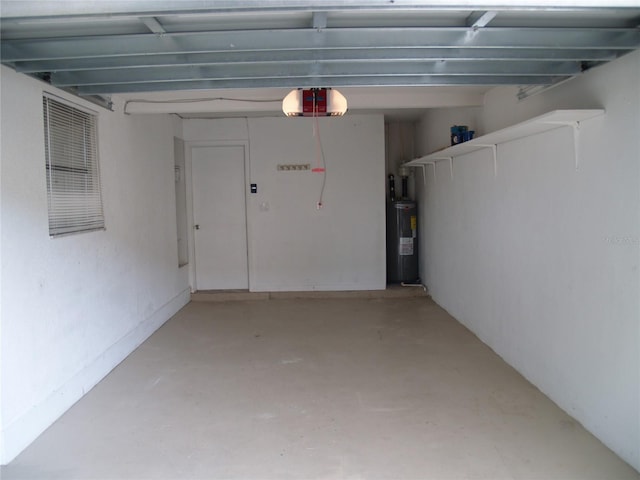 garage with water heater and a garage door opener