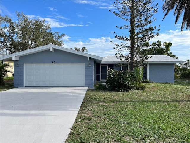 single story home with a front lawn and a garage