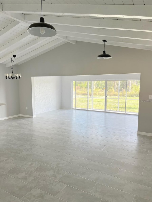 empty room with tile flooring, beamed ceiling, a chandelier, high vaulted ceiling, and plenty of natural light